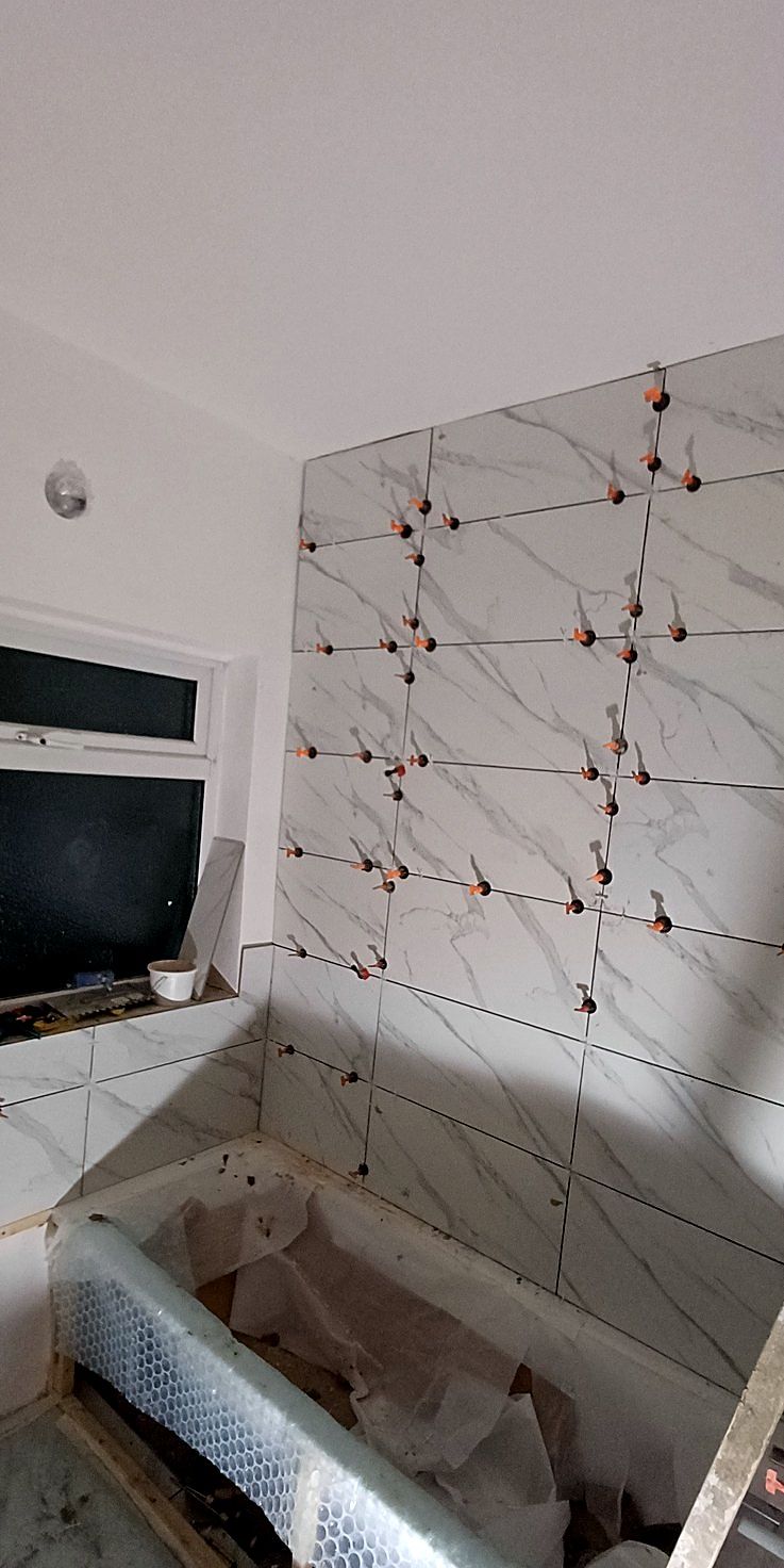 Wall tiles, set out